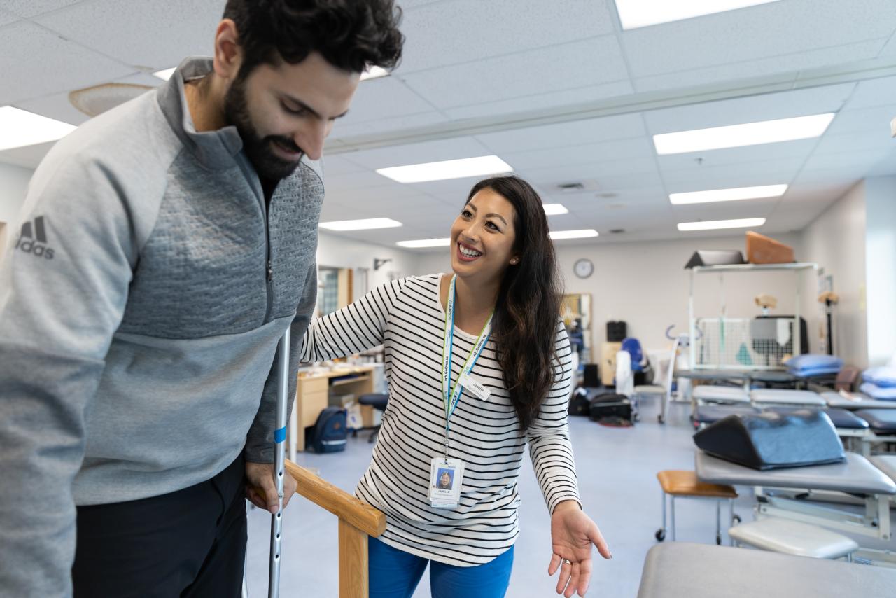 Physiotherapist helps a patient