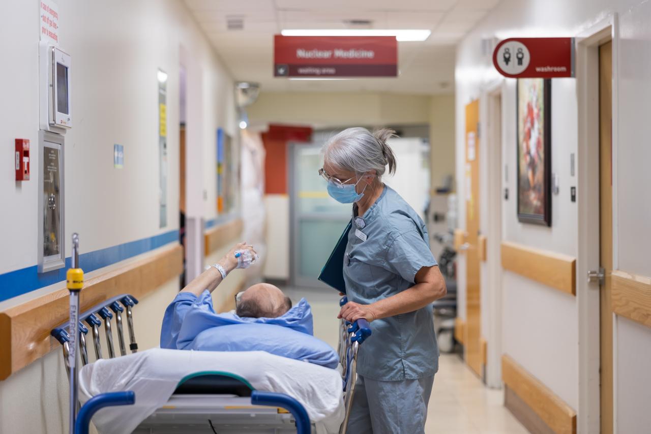 Nursing caring for a patient in Vancouver General Hospital