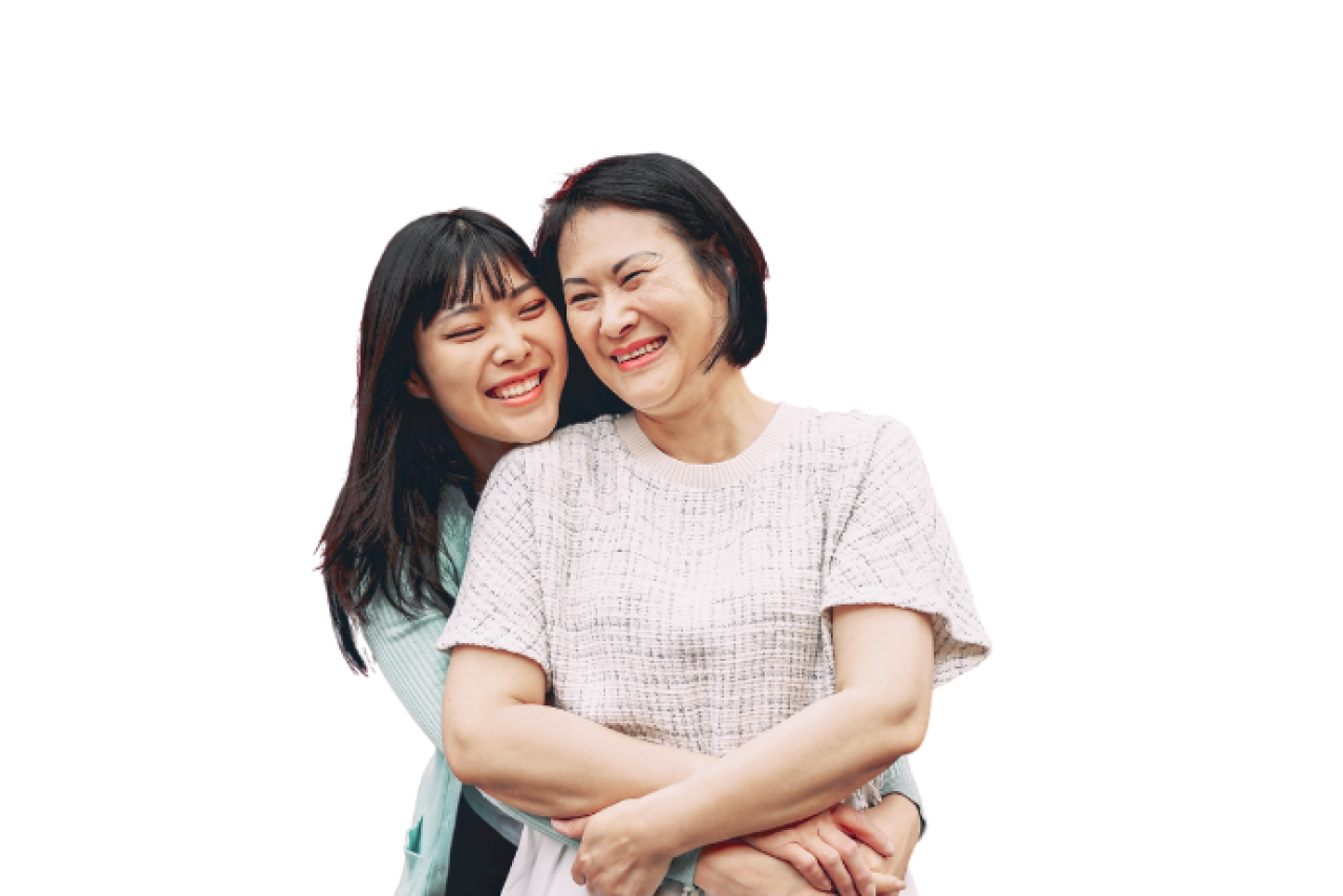 Teenager standing and hugging a close adult from behind.