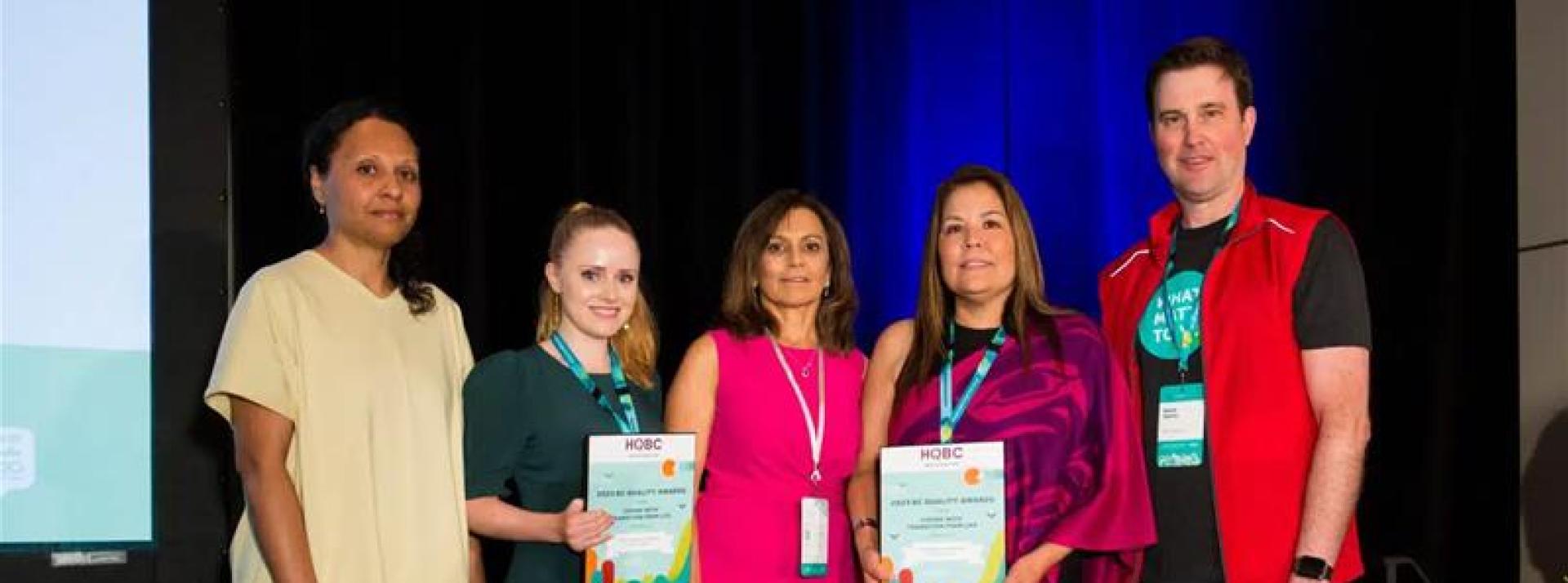 L-R: Leonie Streeter (Tsleil-Waututh Nation), Sierra Roberts (VCH), Dr. Anis Lakha (VCH), and Andrea Aleck (Tsleil-Waututh Nation) receiving the Quality Awards. 