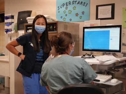 Nurse and physician at station 