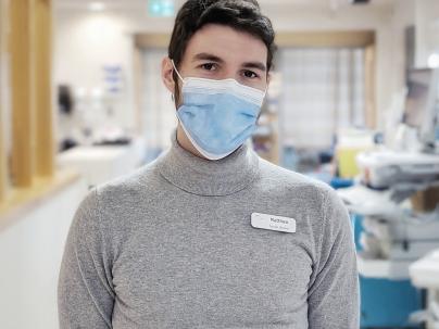 man staring at camera with mask on