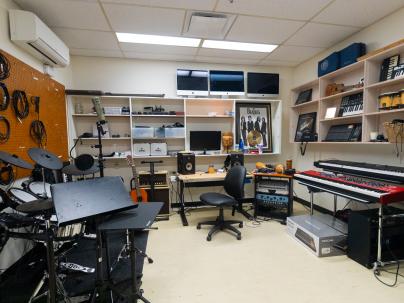 Vancouver Adapted Music Society recording studio room with various musical equipment around the room.