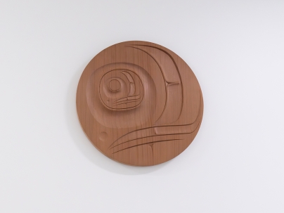 Indigenous wooden carving of a salmon 