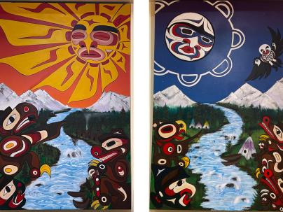 two indigenous artworks of a sunrise and sunset with mountains, forest and a winding river