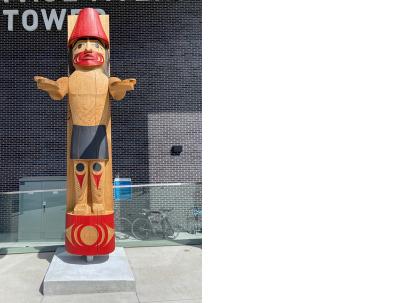 Welcome figure outside Paul Myers Tower hospital building