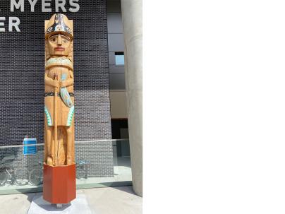 Welcome figure outside Paul Myers Tower hospital building