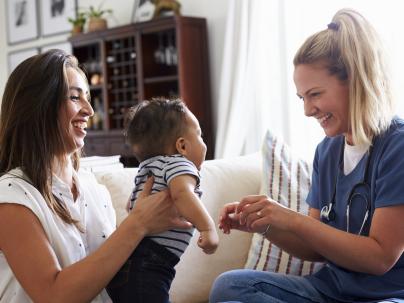 nurse with parent and child