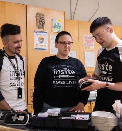 Team at Insite in Vancouver looks at naloxone kit.